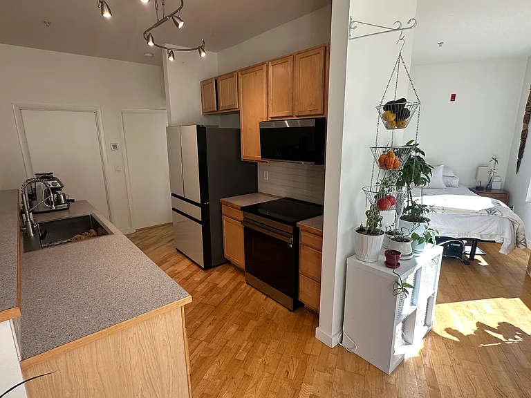 2422 Tremont Pl #103 — Photo 6