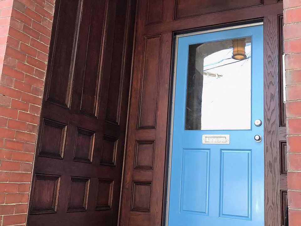 Restored front entryway: well lit ; intercom system 