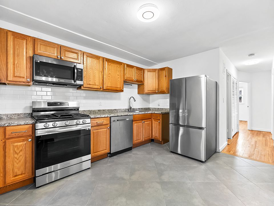 Large Eat In Kitchen with New Stainless Steel Appliances, Dishwasher and Stove all new. Room to put a Kitchen Table.