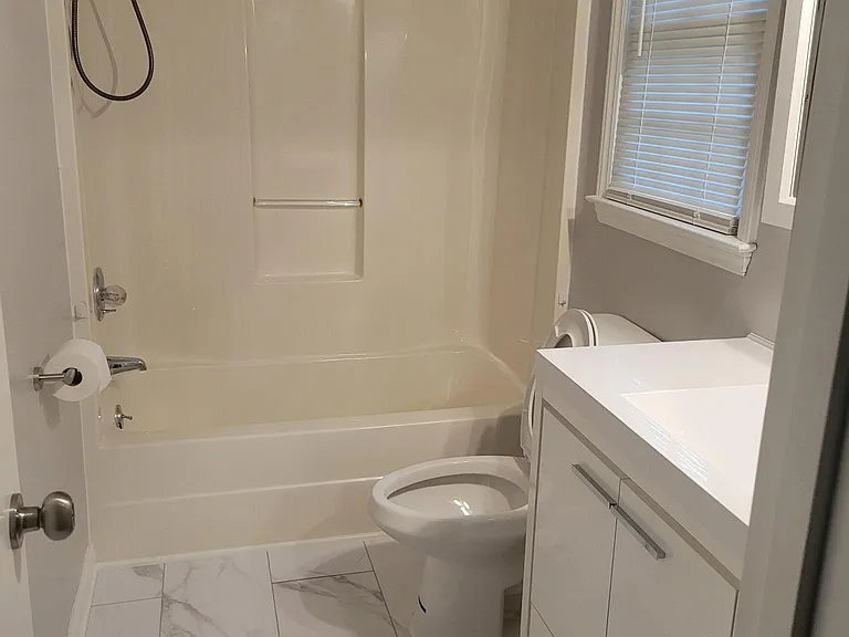 2nd Full Bath (access from hall or 2nd Bedroom)