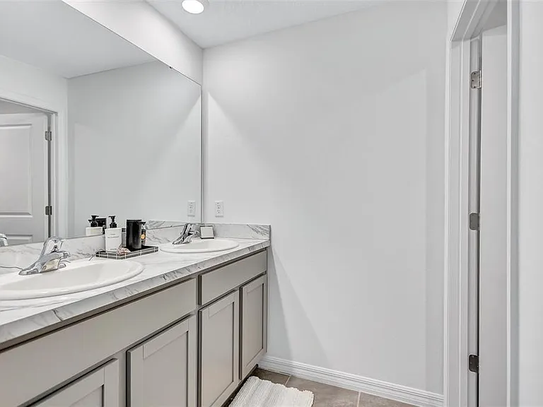 7601 Rosewood Garden Loop — Photo 39