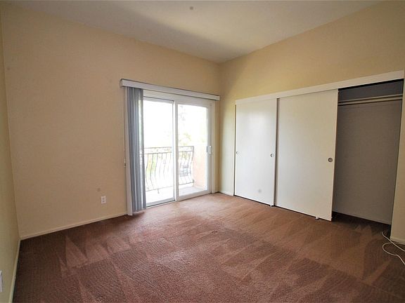 Master with balcony and on suite bath.