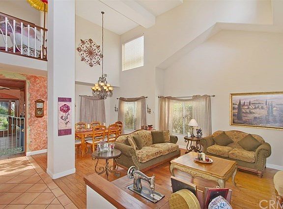 Warm atmosphere for that cozy rustic feel. 2nd story windows in the entry and dining room for natural lighting.