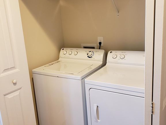 Washer and Dryer closet with shelf