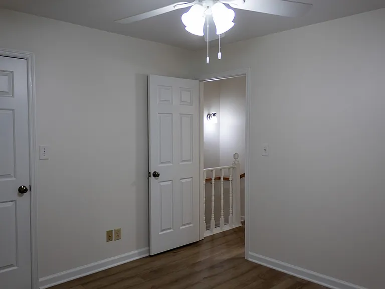 The guest bedroom could also serve as a child's bedroom or an office.