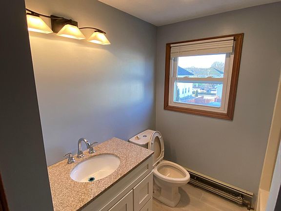 Remodeled Bathroom with Granite Countertop
