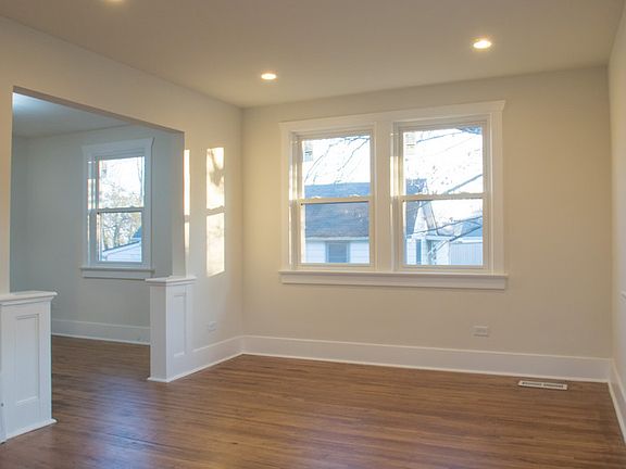LIVING ROOM
						:
						New windows, original hardwood, everything refinished and brand new.