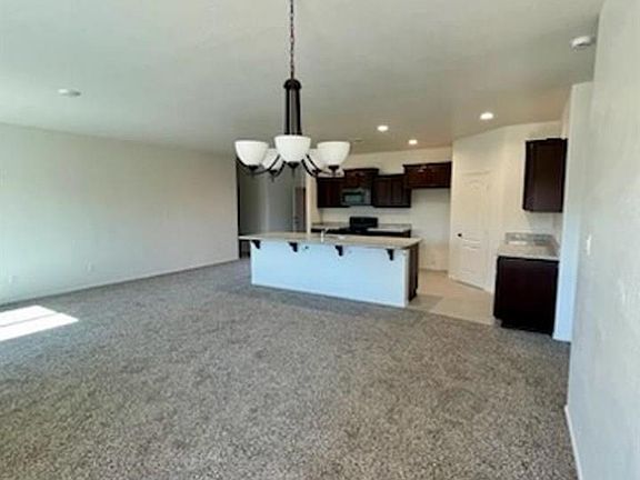 4th image of 7649 E 43rd Pl
