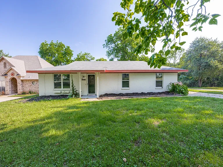 Adorable home on this huge lot! Driveway around back to the 2 car garage