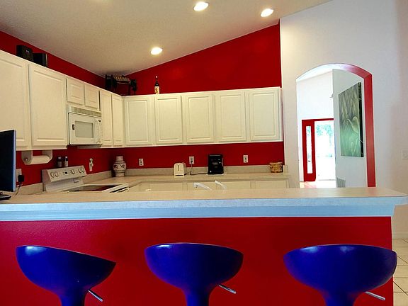 Open kitchen with bar stools