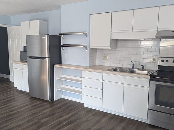 Kitchen and Dining area. Has a rolling or stationary Island and portable dishwasher not in this picture.