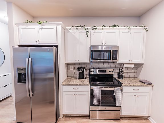 Fully equipped kitchen with keurig and stainless steel appliances