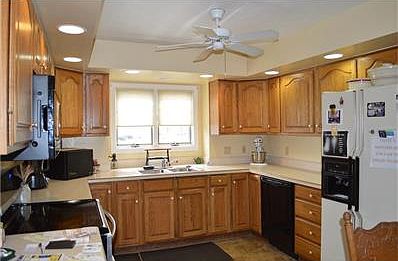 Appliances stay.  Check out microwave when you are there it opens either side.