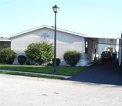 New 50'+ asphalt drive with carport