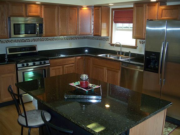 Granite, stainless, island with seating 