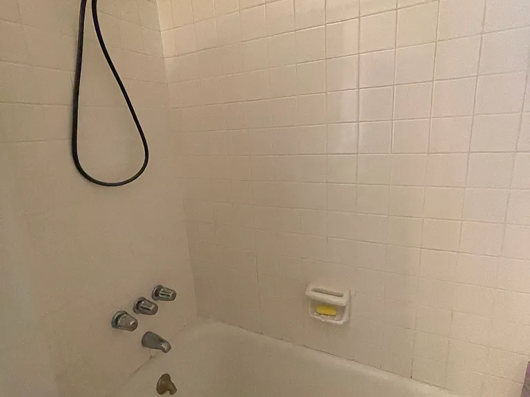 white tile bath shower t & tub