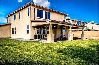 Spacious yard and manicure lawn.