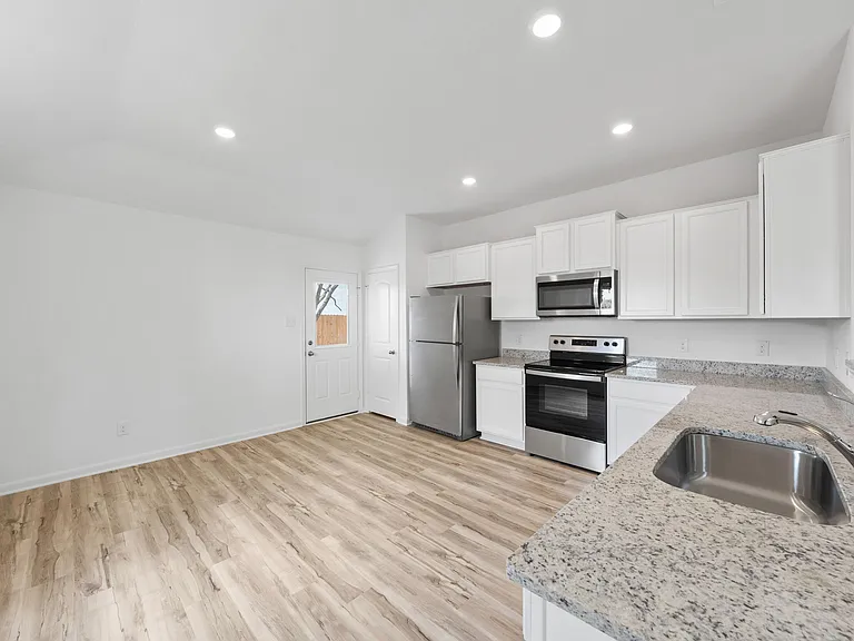 Space in the kitchen for a dining table.
