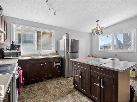 4th image of 12725 83rd St NW #12727