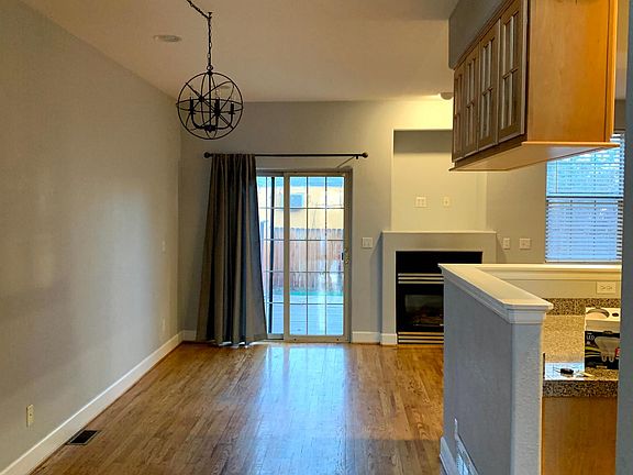 Dining area with doors leading to patio