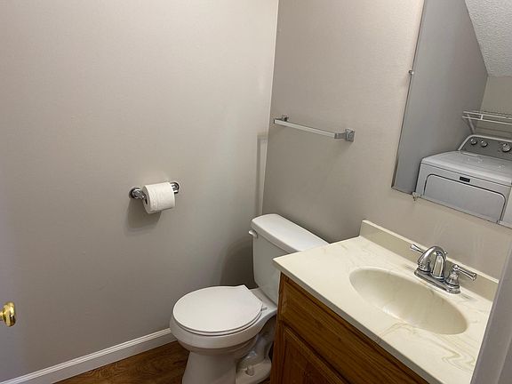 Main level half bath with laundry