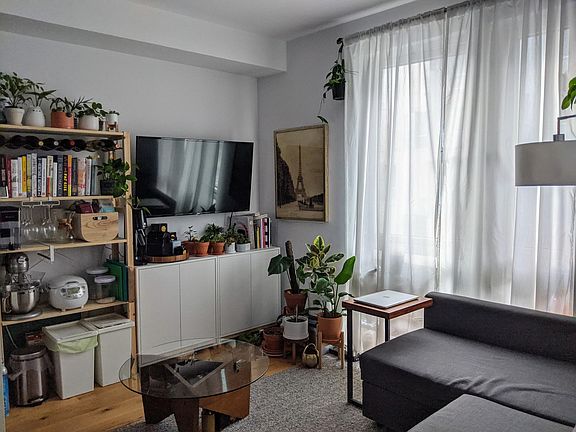 Wall mounted TV with Roku included.