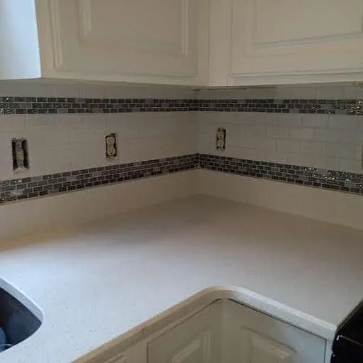 White Mirror Quartz Countertops w/Custom Ceramic Glass Backsplash