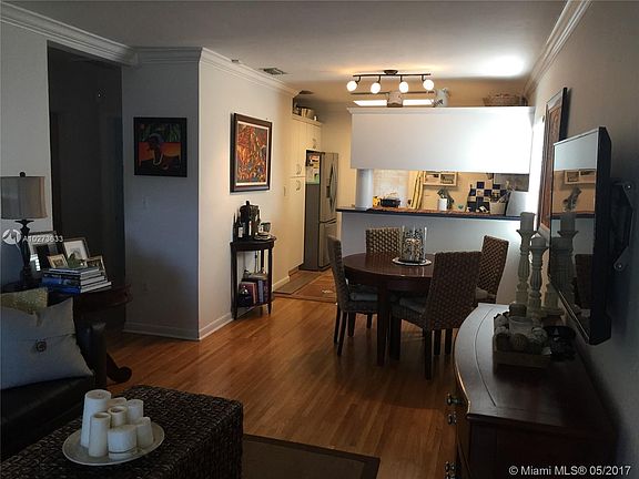 Living/Dining Area. Remodeled kitchen with stainless steel appliances.