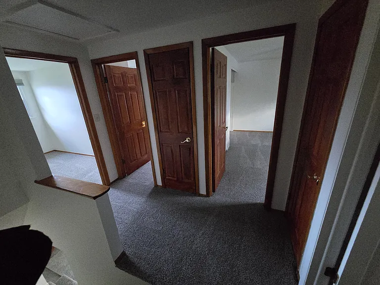 2nd Floor Common Area/Hallway. Closed doors are both Storage Closets.