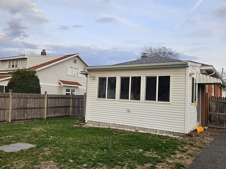 Backyard+View of sunroom