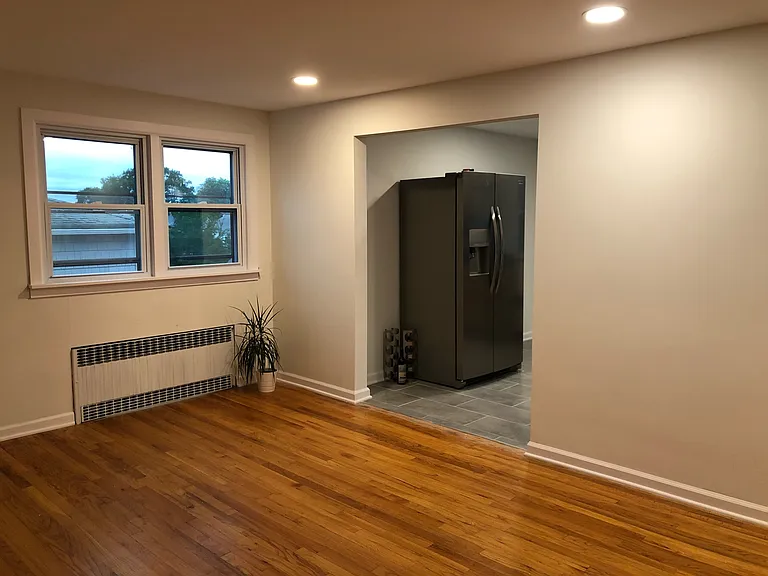 living room and entrance to kitchen