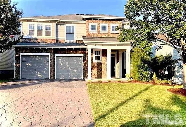 A very bright highly upgraded Stone front Skyland Model Home with open floor plan, large front yard and large private wooded backyard in a great neighborhood.