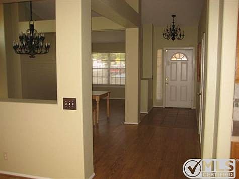 From family room you can see the entry to front door and to the left side the view of the size of the dining room and living room.