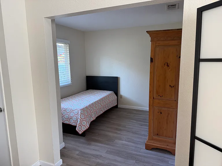 This additional private room on the first floor can be used as a fourth bedroom but can also be used as an office or formal dining room. Privacy doors to be installed soon.