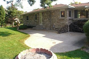 Non-snow view of Patio with firepit