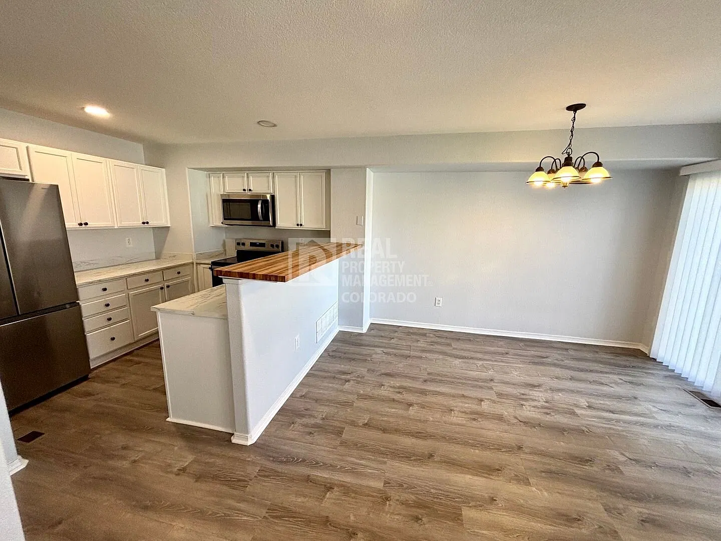 Spacious 4-Bedroom Townhome with Modern Updates — Photo 3