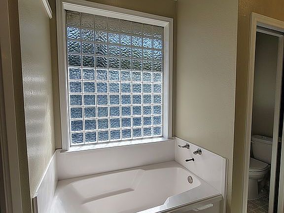 PRIMARY BATH-SOAKER TUB