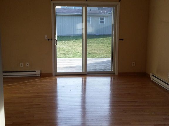 Great room. Hardwood floors, sliding door to deck.