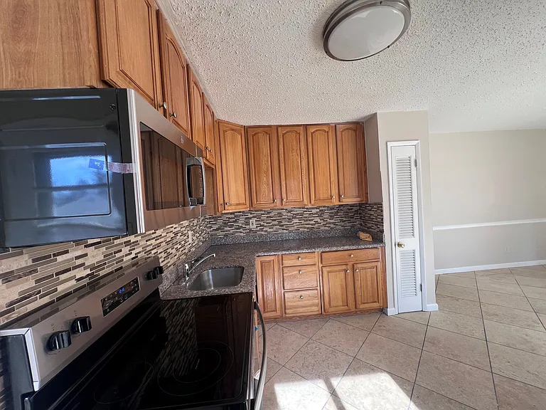 8908 Saint Louis Ave — Photo 7