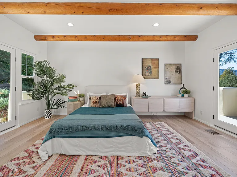 Also has both east and west facing outdoor spaces, large doors