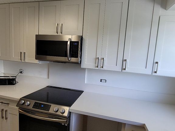 kitchen - new cabinets, new appliances. Dishwasher will be installed on August 1.