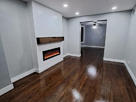 Living room area with chimney