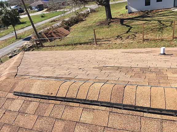 Roof repair after Michael