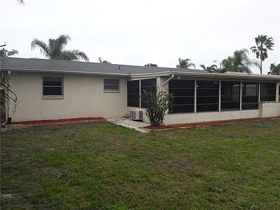 Rear--enclosed lanai.