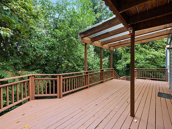 Deck off Main house faces North, Woods, & Winter Stream