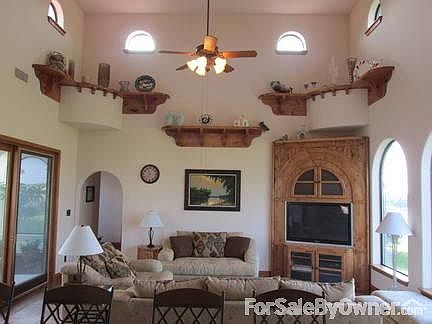 Family Room : View from the Kitchen, showing built-in Entertainment Unit and Custom Shelving