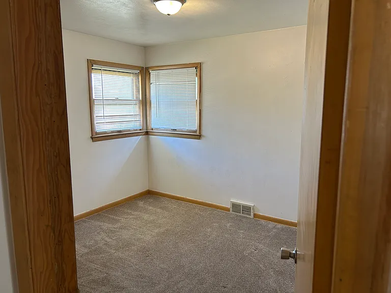 Bedroom 2 has corner windows