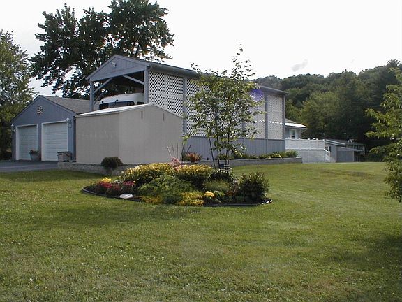 flower garden by side of house