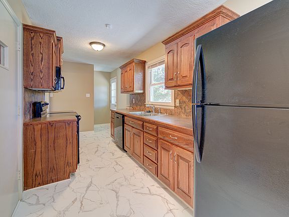 5th image of 6604 N Campbell St