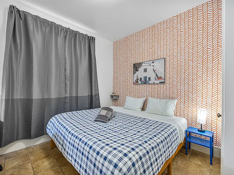 Bedroom with king size bed.